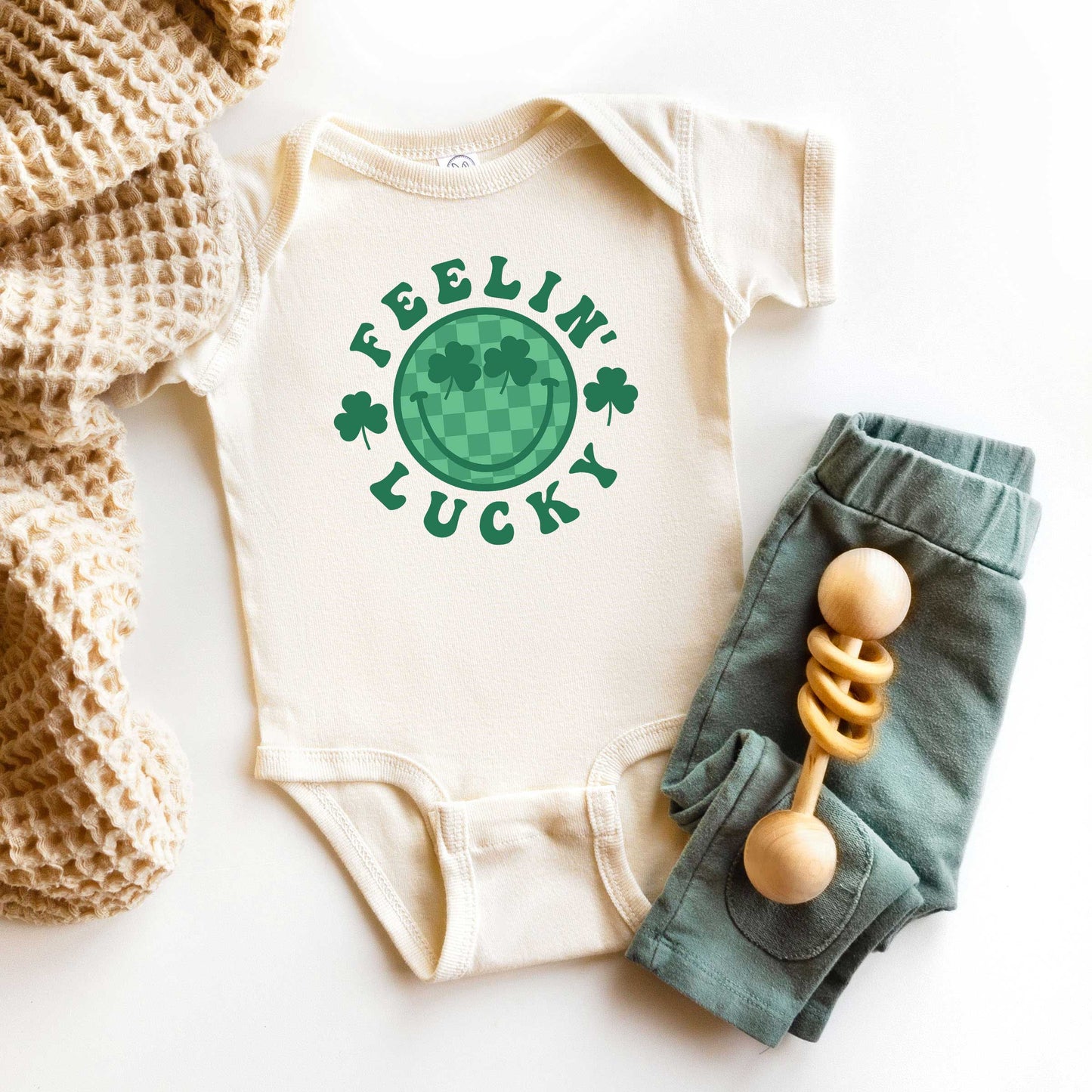 Feelin Lucky Checkered Smiley Face | Baby Graphic Short Sleeve Onesie