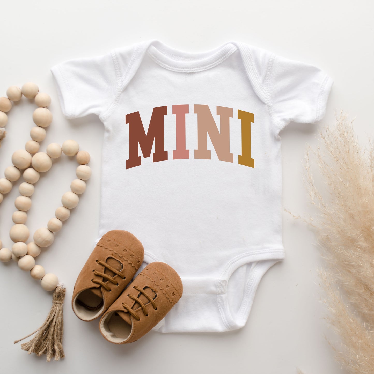 Mini Colored Arch | Baby Graphic Short Sleeve Onesie