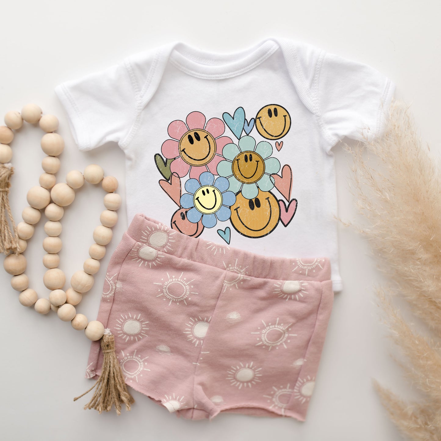 Flower Smiley Face | Baby Graphic Short Sleeve Onesie