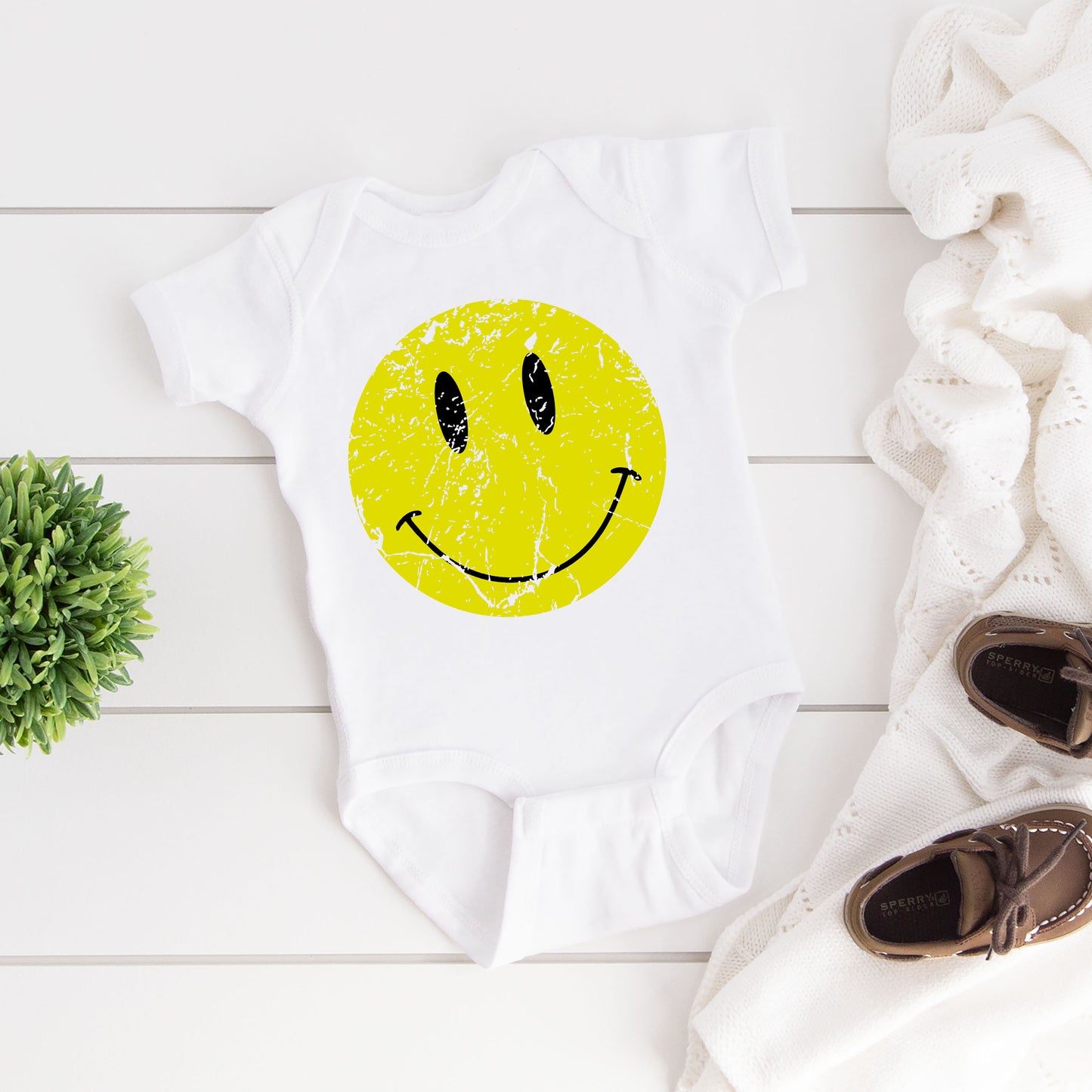 Distressed Smiley Face | Baby Graphic Short Sleeve Onesie