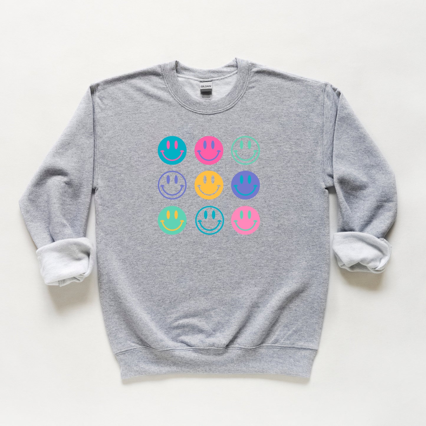 Stacked Smiley Faces | Youth Sweatshirt