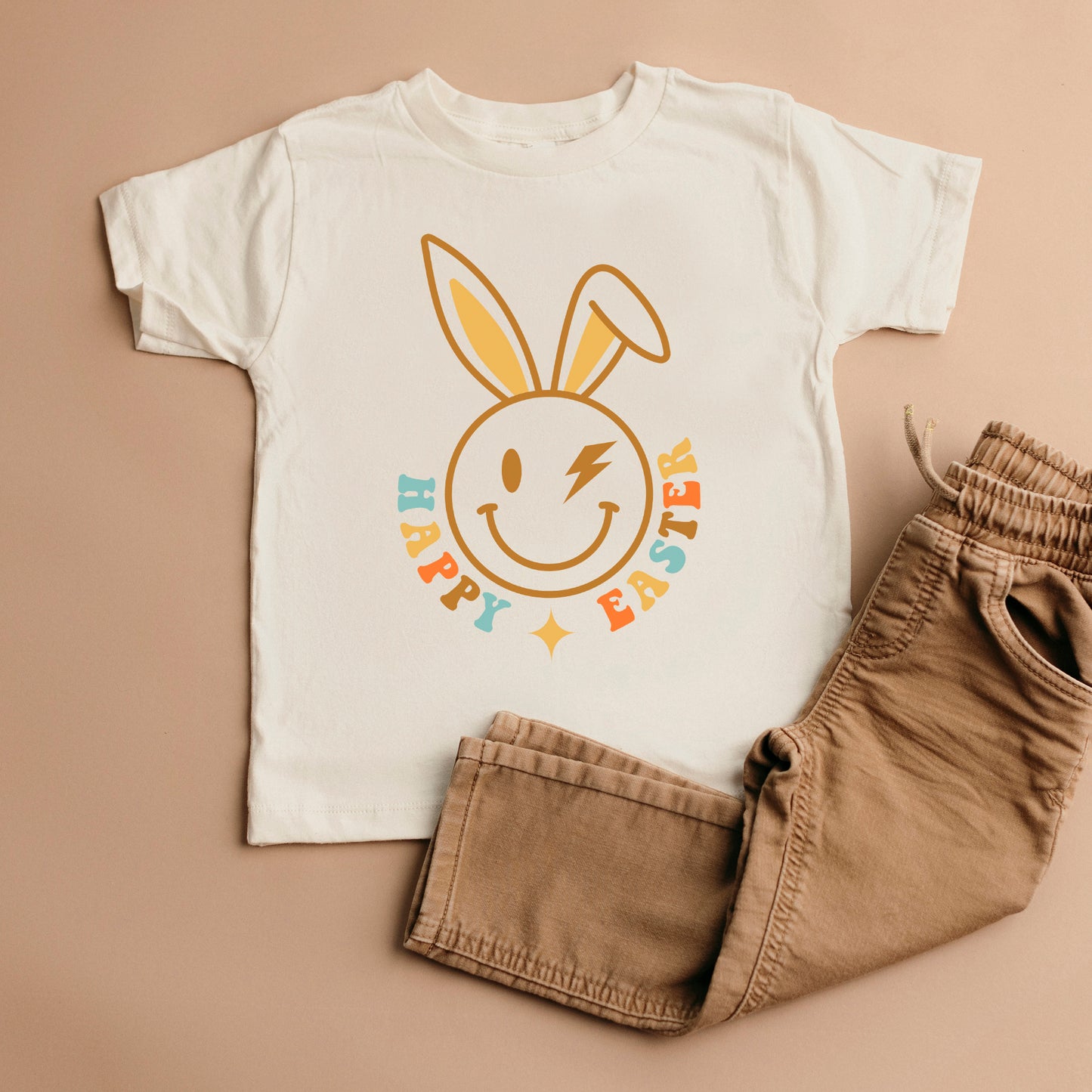 Happy Easter Smiley Lightning Bolt | Toddler Graphic Short Sleeve Tee