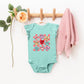 Candy Heart Smile Solid | Baby Graphic Flutter Sleeve Onesie