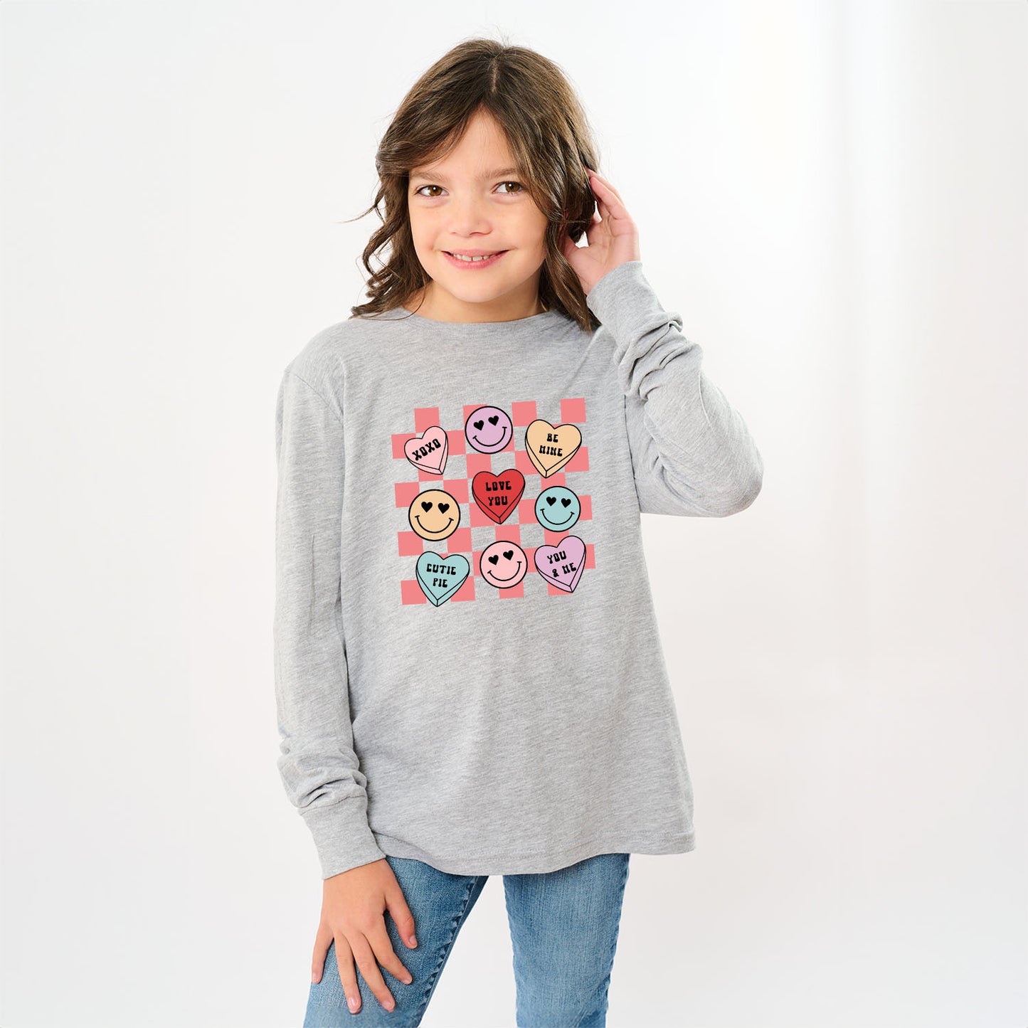 Candy Heart Smile Solid | Youth Graphic Long Sleeve Tee