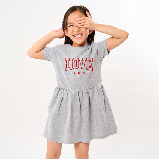 Love Vibes Varsity | Toddler Graphic Dress