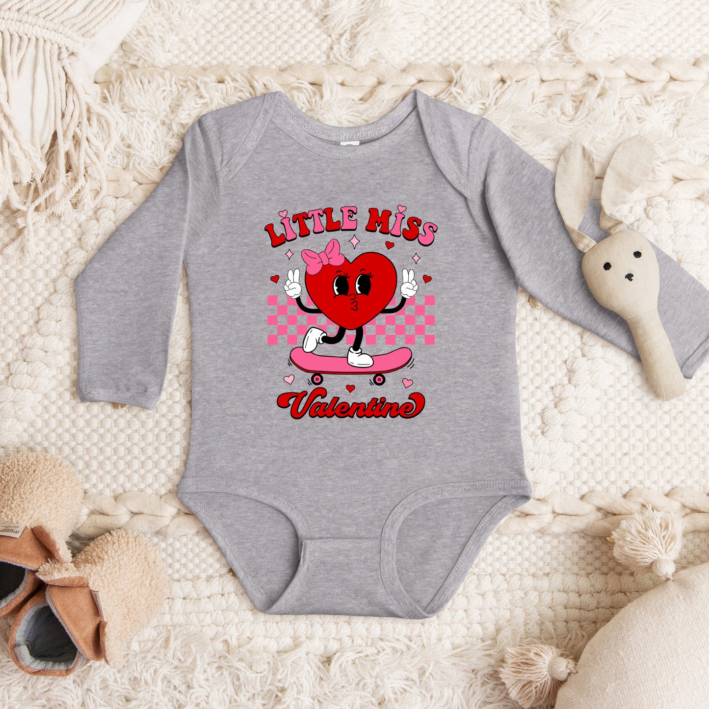 Little Miss Valentine Skateboard | Baby Graphic Long Sleeve Onesie