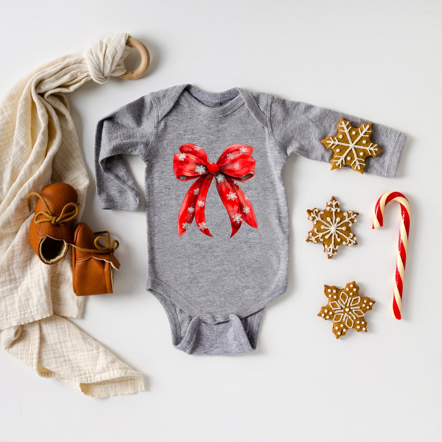 Coquette Christmas Snowflake Bow | Baby Graphic Long Sleeve Onesie