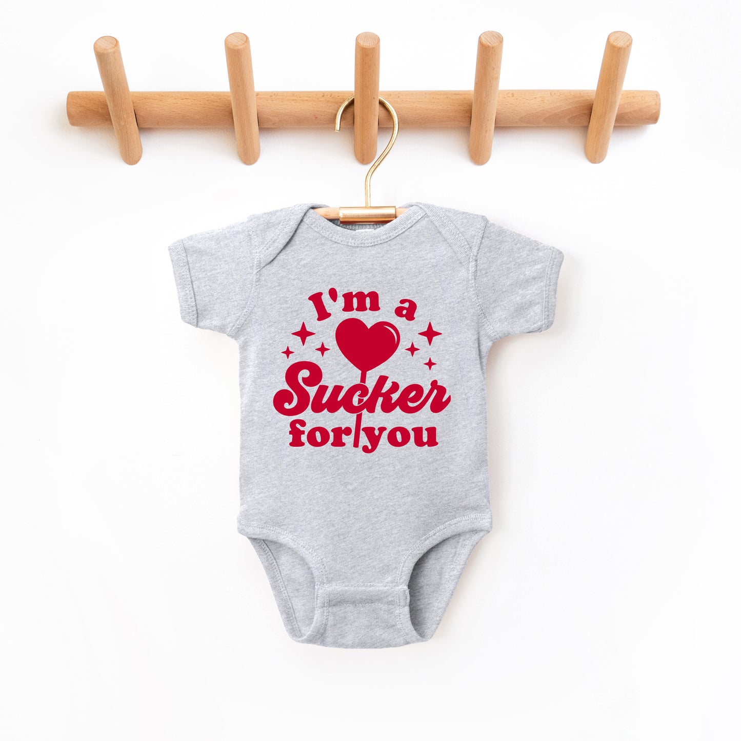 Sucker For You | Baby Graphic Short Sleeve Onesie