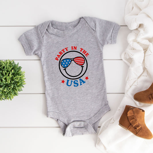 Party In The USA Smiley Face | Baby Graphic Short Sleeve Onesie