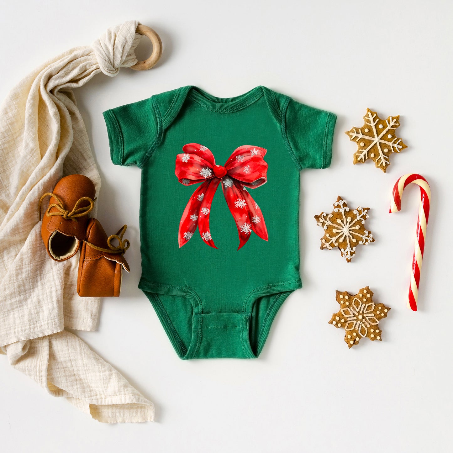 Coquette Christmas Snowflake Bow | Baby Graphic Short Sleeve Onesie