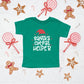 Santa's Cutest Helper Glitter | Toddler Graphic Short Sleeve Tee