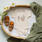 Deer Snowman Scene | Baby Graphic Short Sleeve Onesie