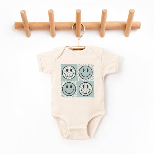 Four Checkerboard Smiley Faces | Baby Graphic Short Sleeve Onesie