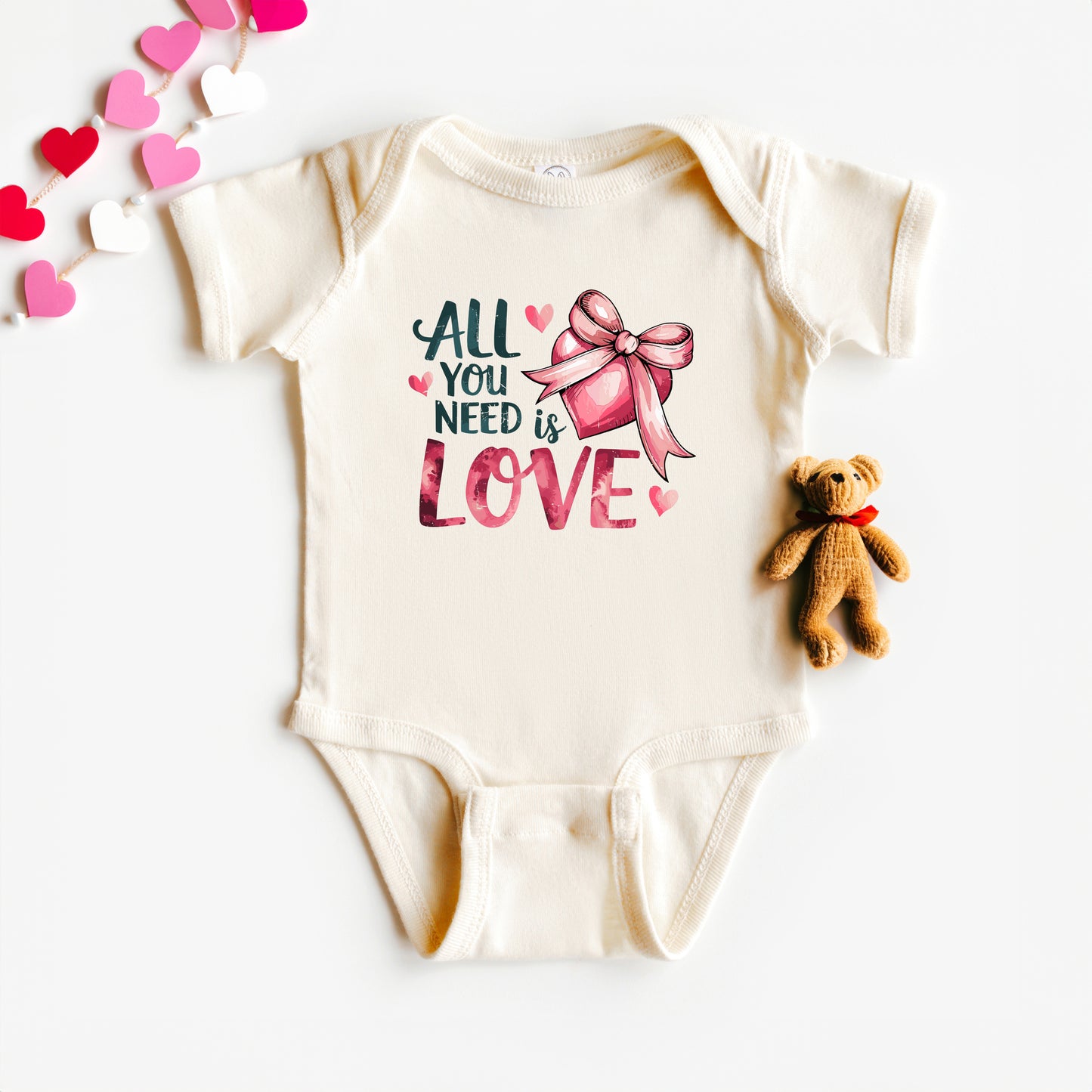 All You Need Is Love Coquette | Baby Graphic Short Sleeve Onesie