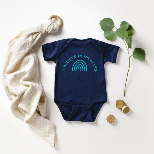 I Believe In Miracles Rainbow | Baby Graphic Short Sleeve Onesie