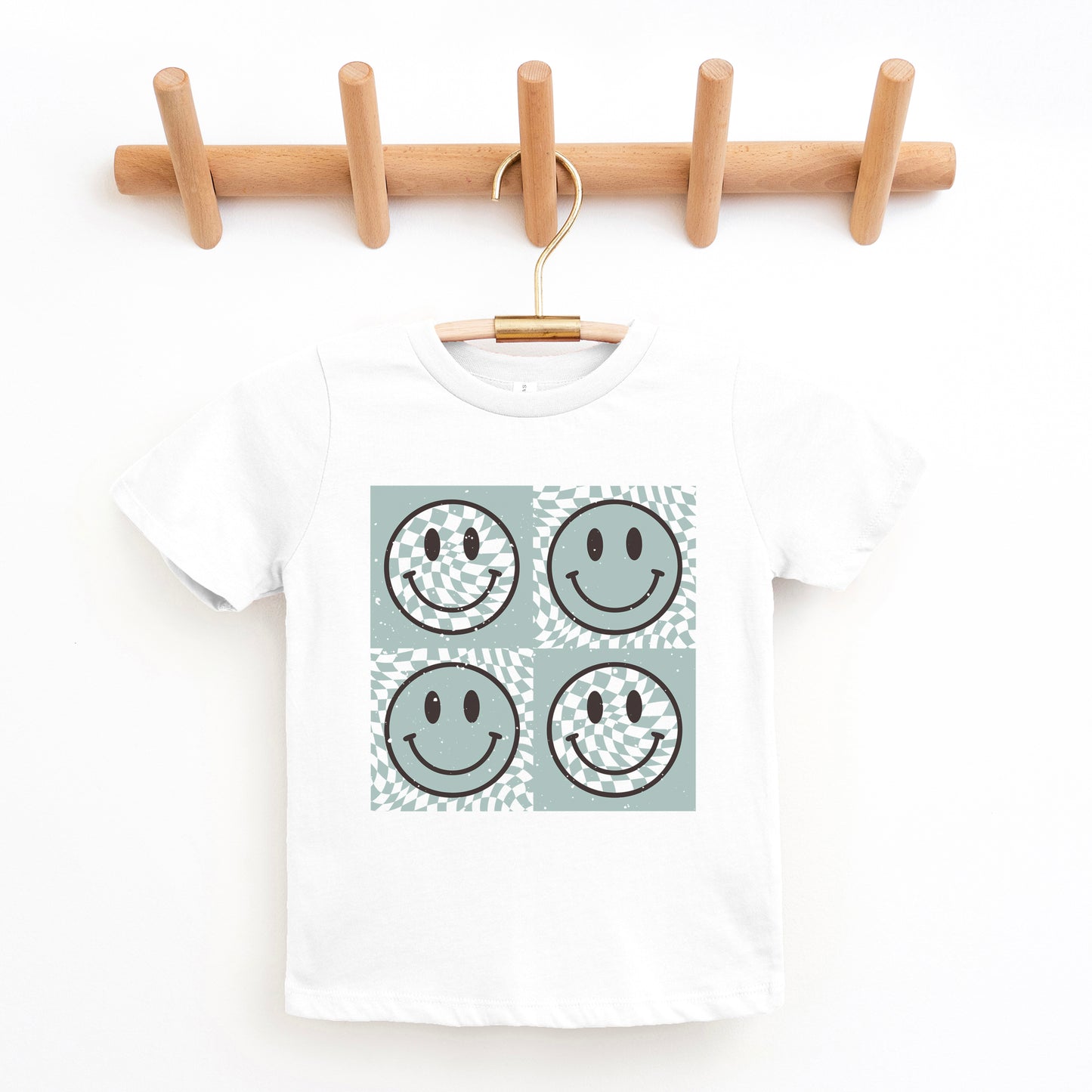 Four Checkerboard Smiley Faces | Youth Graphic Short Sleeve Tee