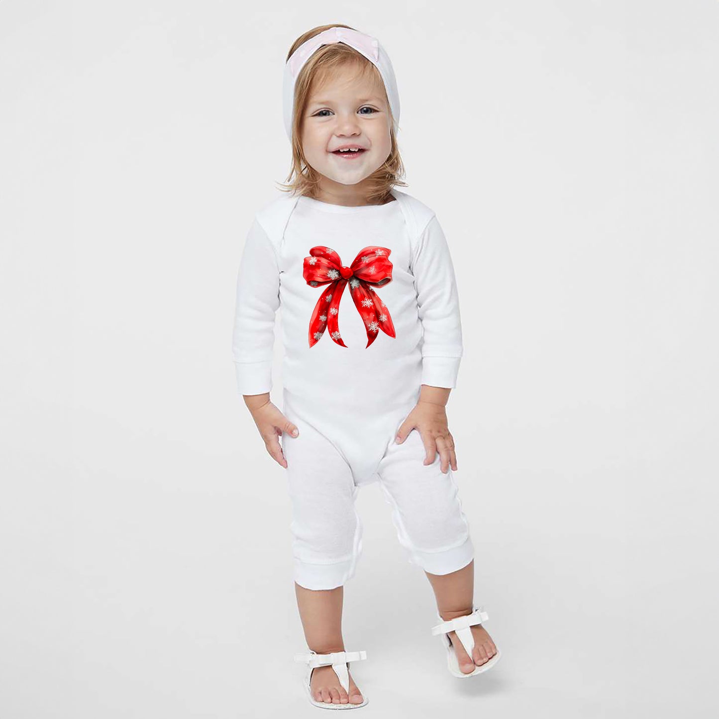 Coquette Christmas Snowflake Bow | Baby Graphic Romper