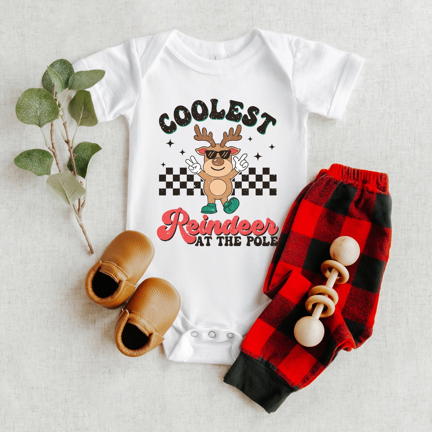 Coolest Reindeer At The Pole | Baby Graphic Short Sleeve Onesie