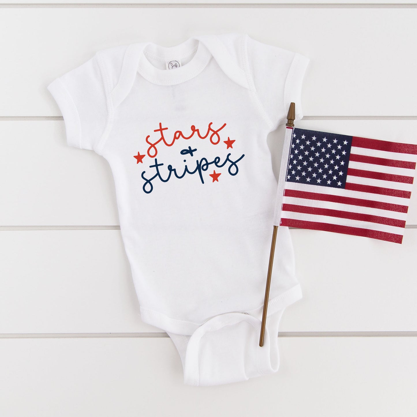 Patriotic Stars and Stripes Cursive | Baby Graphic Short Sleeve Onesie