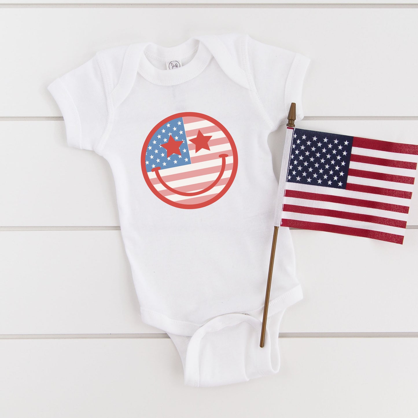 Flag Smiley Face | Baby Graphic Short Sleeve Onesie