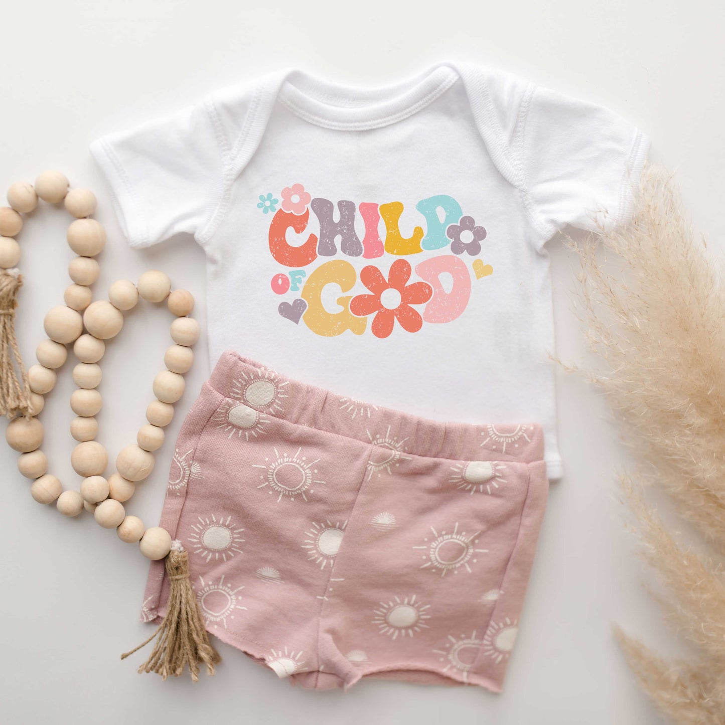 Child Of God Flowers | Baby Graphic Short Sleeve Onesie