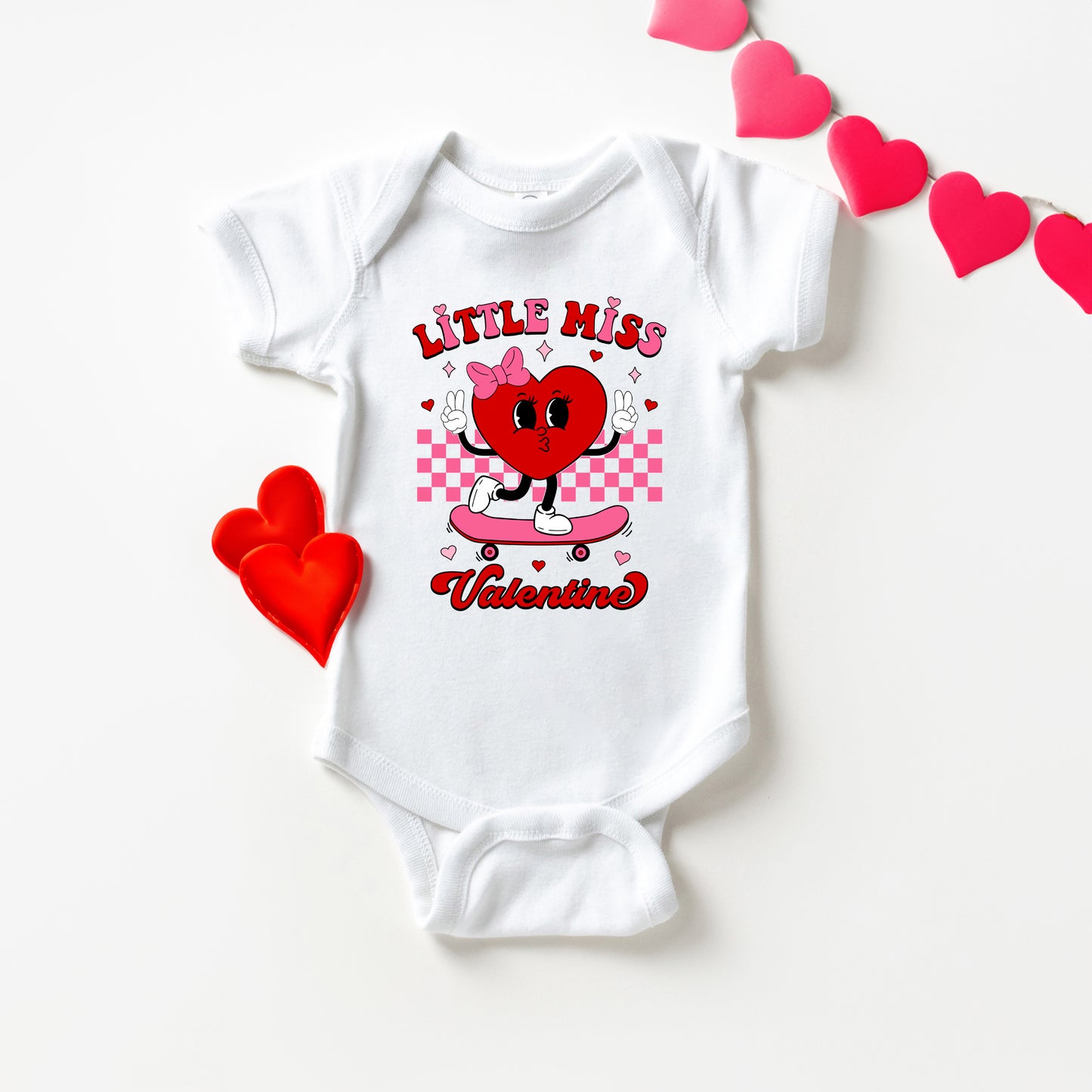 Little Miss Valentine Skateboard | Baby Graphic Short Sleeve Onesie