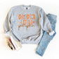 Daddy's Little Pumpkin | Youth Graphic Sweatshirt